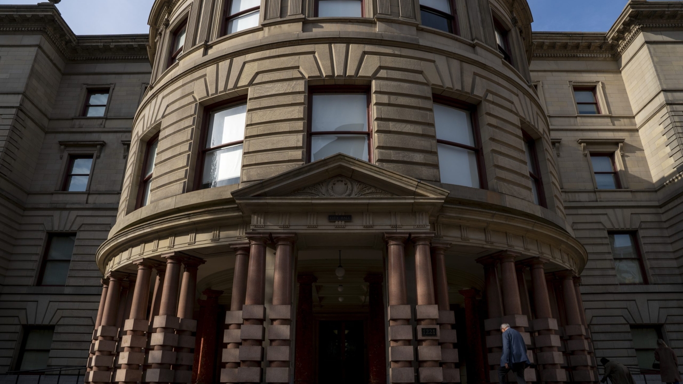 A man walks into Portland City Hall on Nov. 12, 2025 in Portland, Ore.